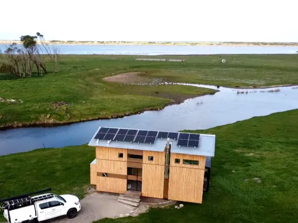 Solar panels powering a tiny home in the country